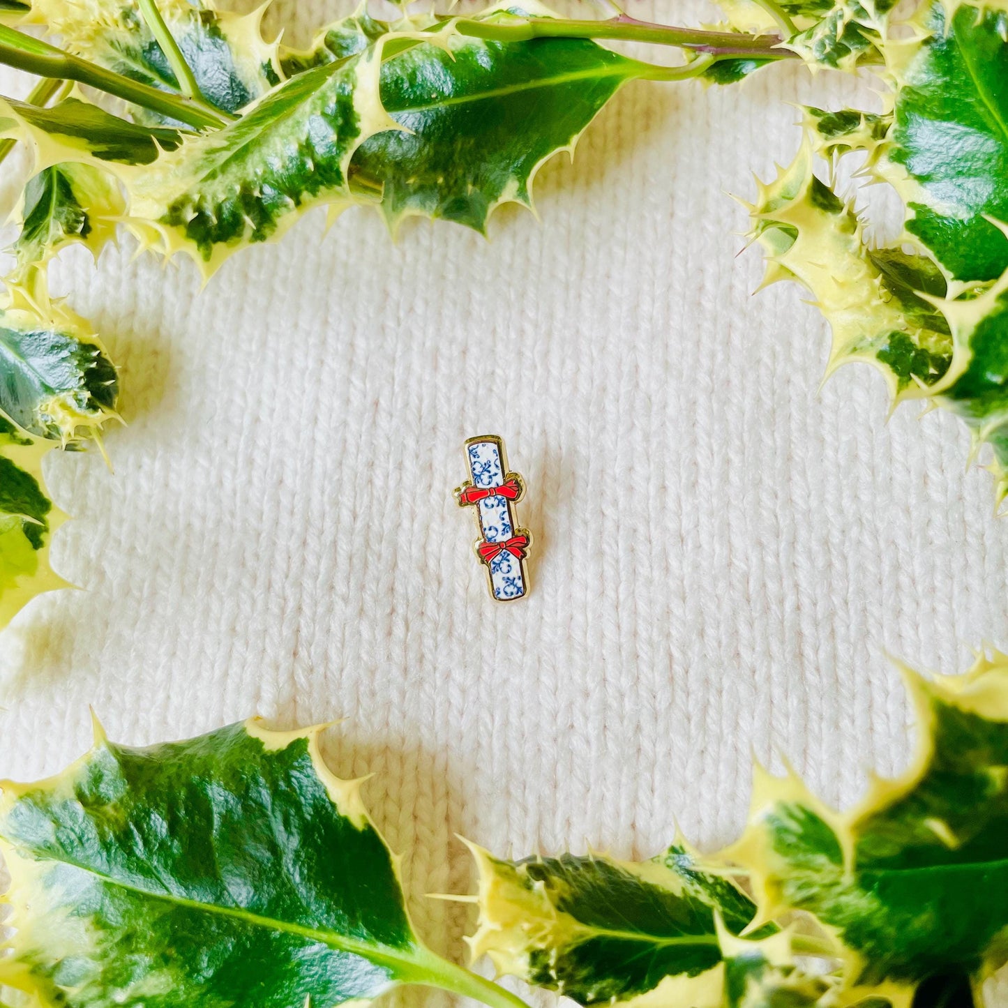 Blue and white and cream Christmas cracker gold hard enamel mini pin badge