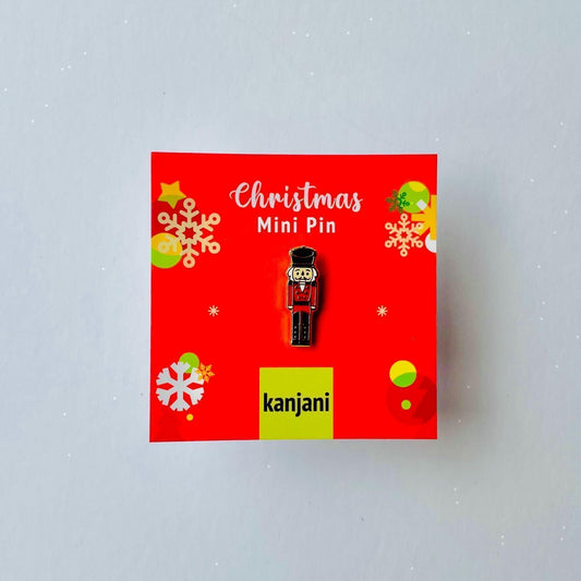 Red and black Nutcracker soldier gold hard enamel pin badge