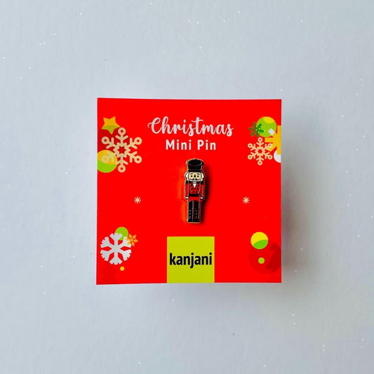 Red and black Nutcracker soldier gold hard enamel pin badge