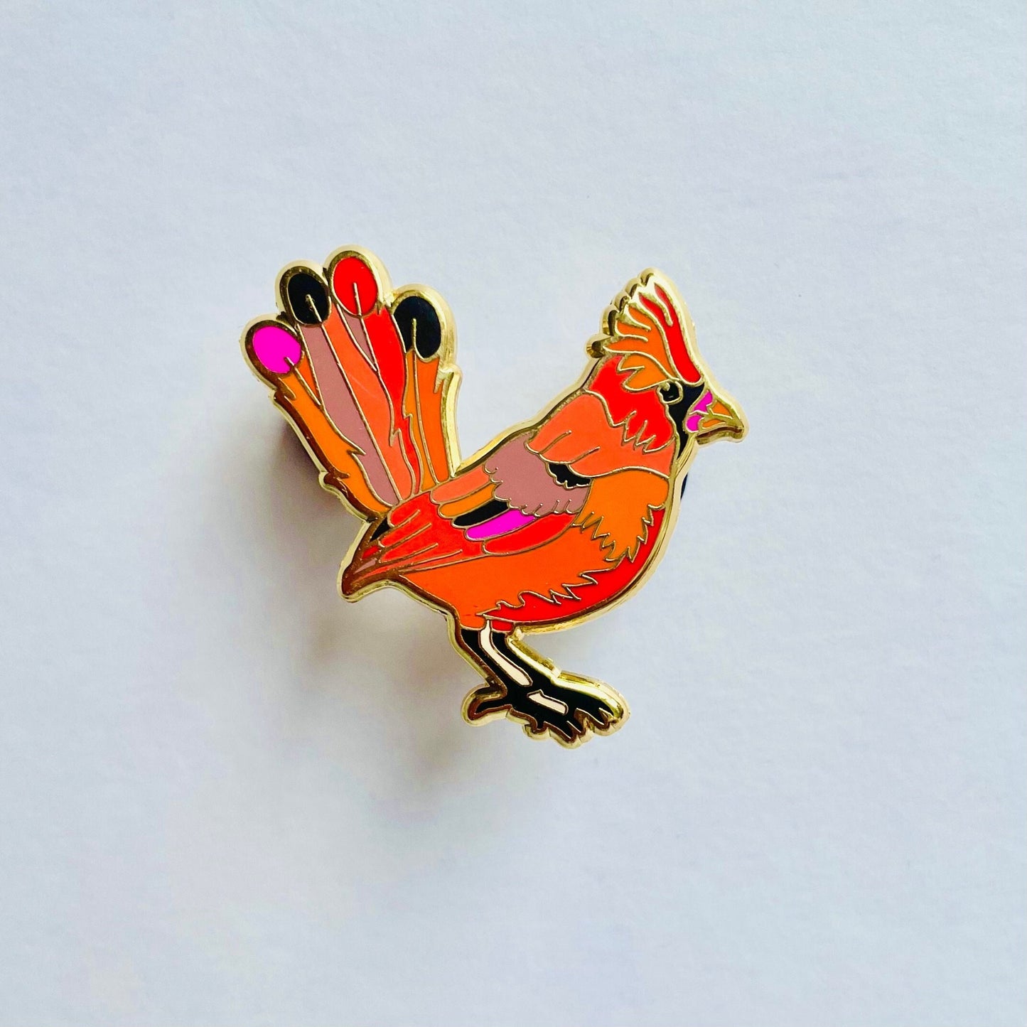 Red cardinal enamel pin