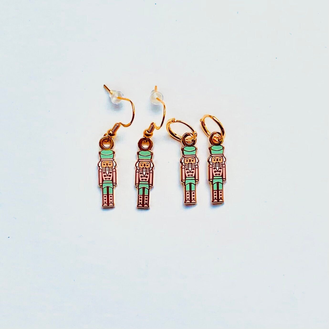 Pink and teal nutcracker soldier earrings