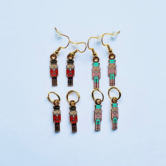 Nutcracker soldier earrings in Black and red  pink and teal
