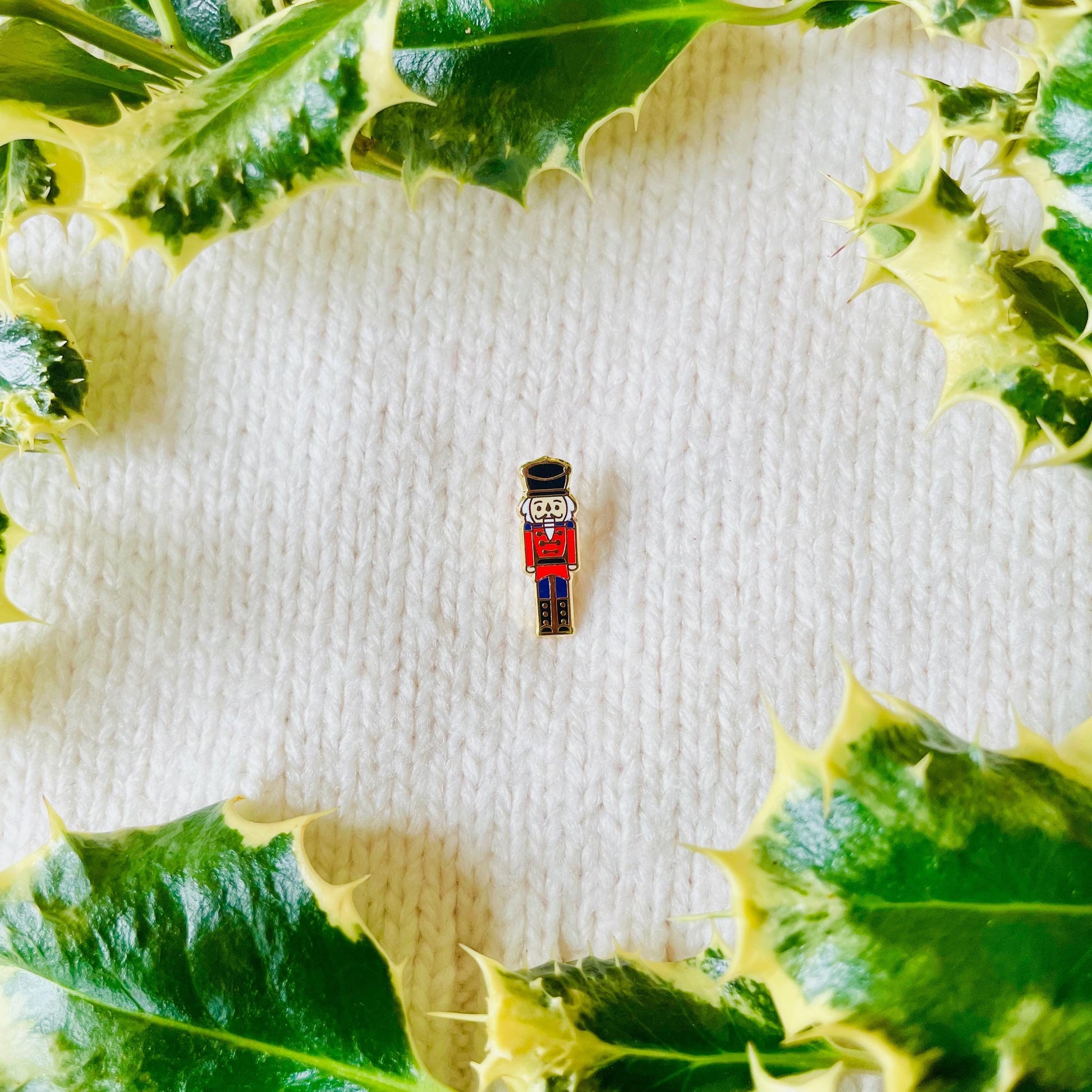 Red and black Nutcracker soldier gold hard enamel pin badge