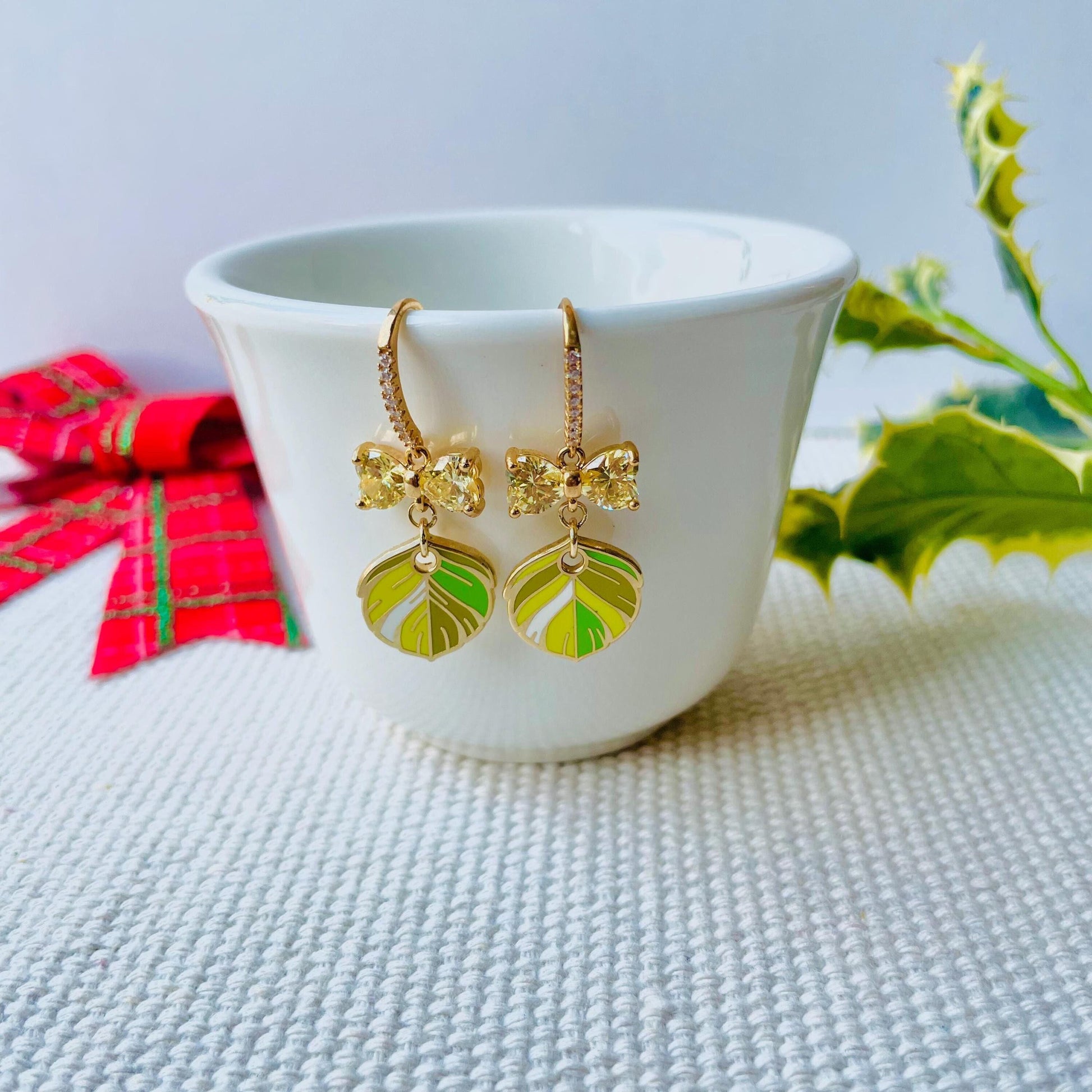 Bow feather lime citrus green dangle drop enamel cubic zirconia earrings