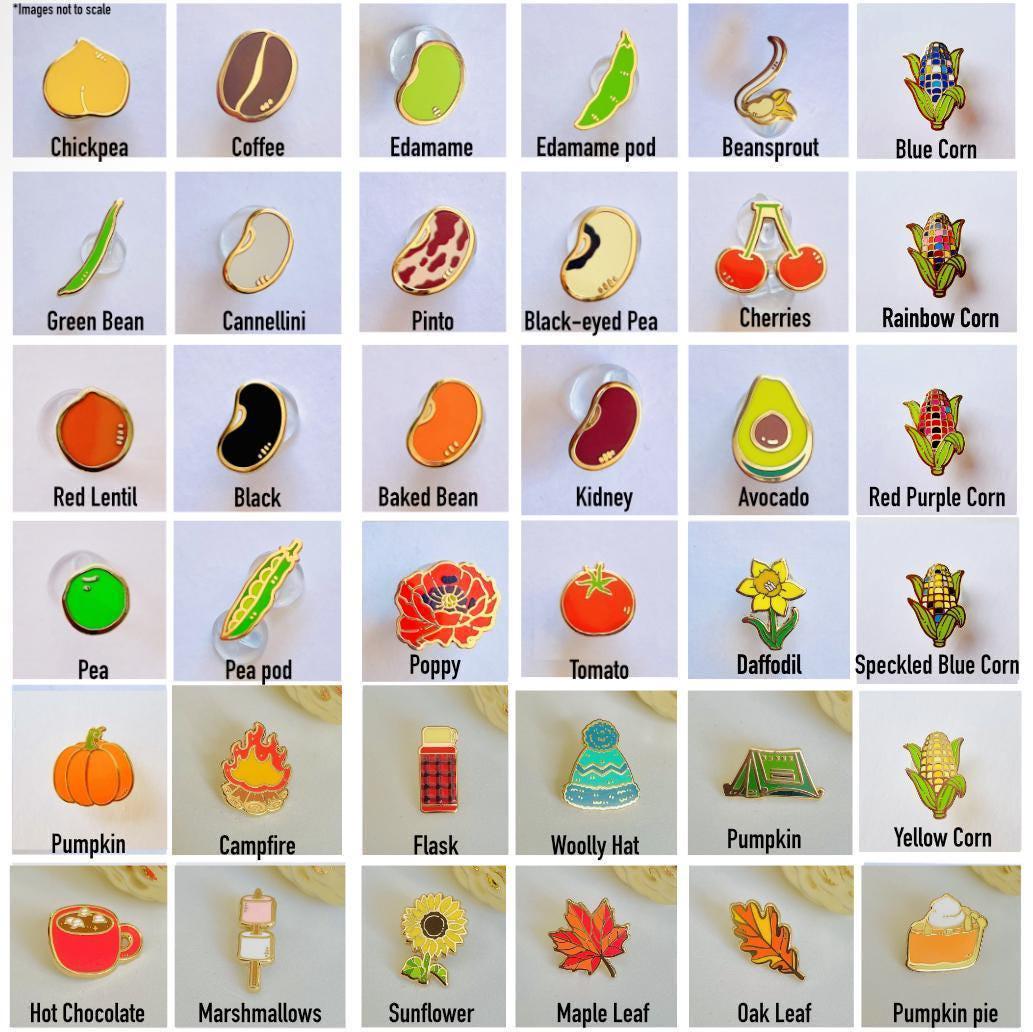 a bunch of different types of pin badges