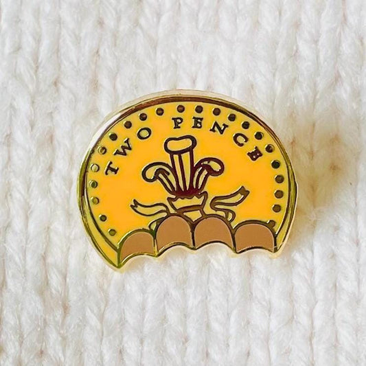 Half eaten bitten foil covered chocolate coin two pence gold hard enamel pin badge