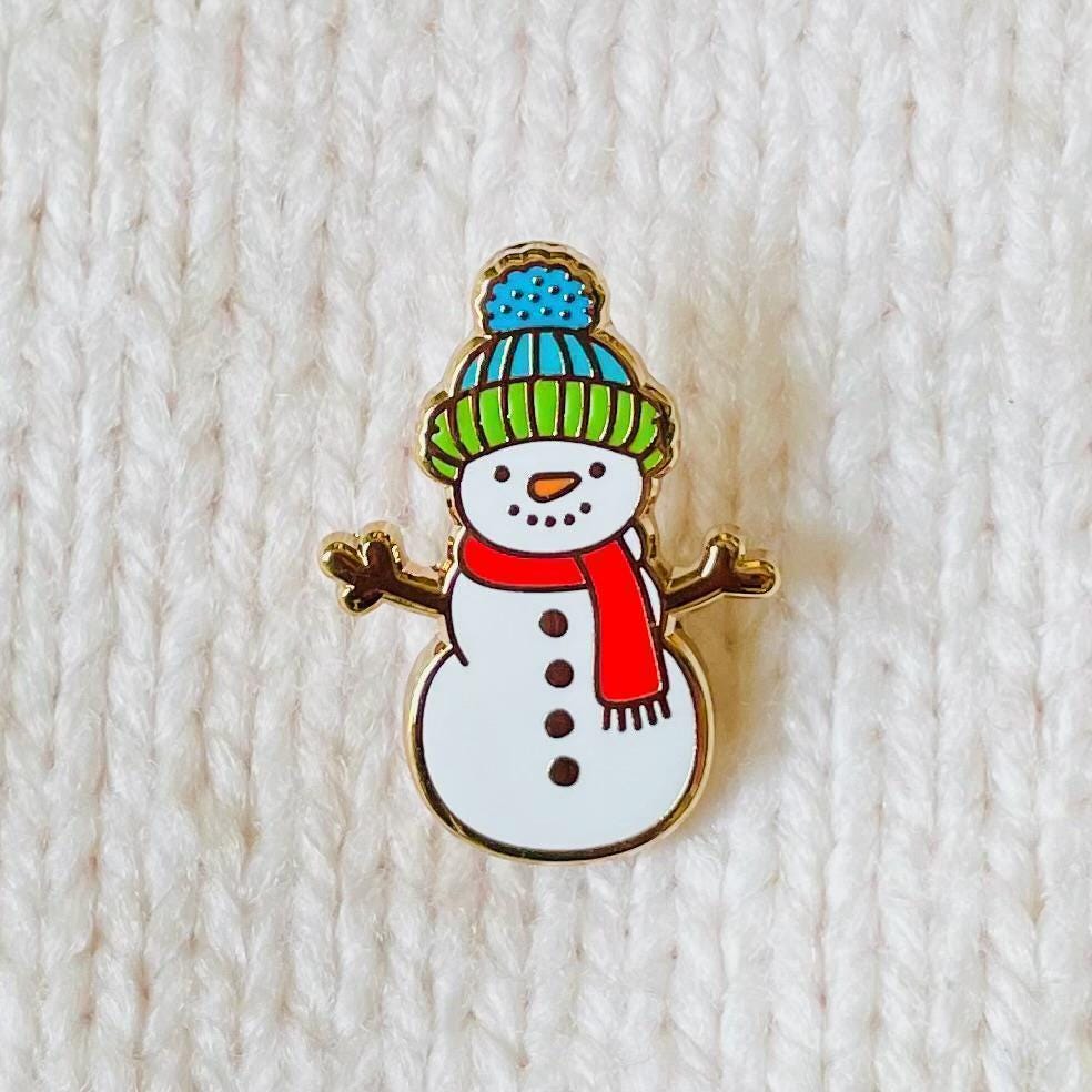 White blue green woolly hat carrot nose snowman gold hard enamel mini pin badge