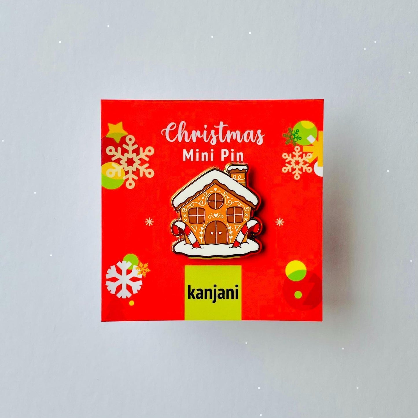 Snowy Gingerbread house cottage gold hard enamel mini pin badge