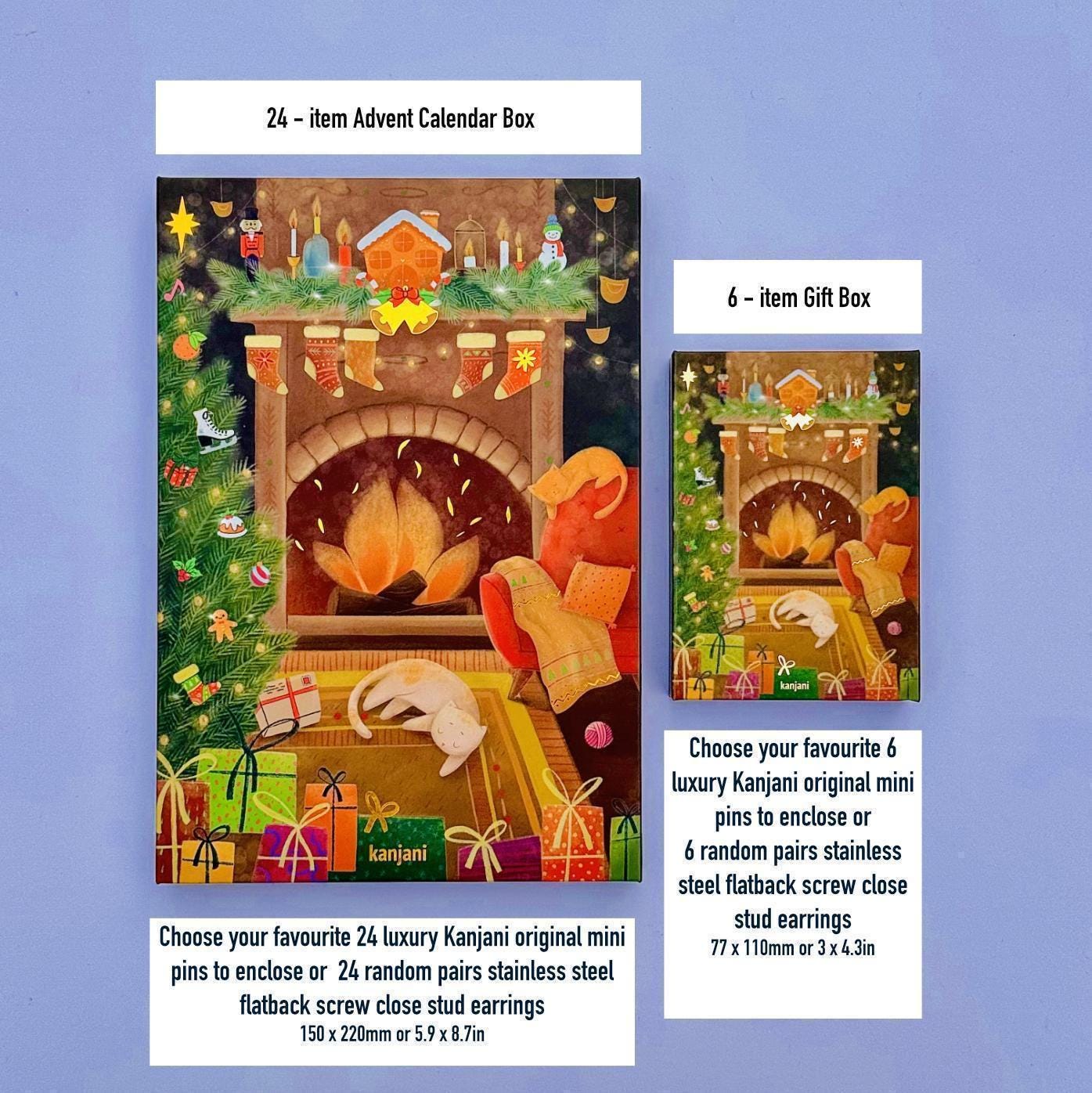 The image is a Christmas-themed advent calendar featuring a fireplace with a Santa Claus figure, presents, and other holiday decorations.