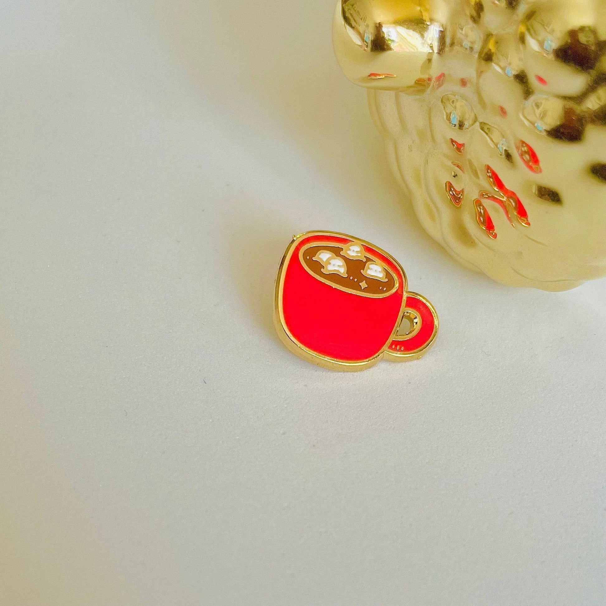 Hot chocolate gold hard enamel mini pin