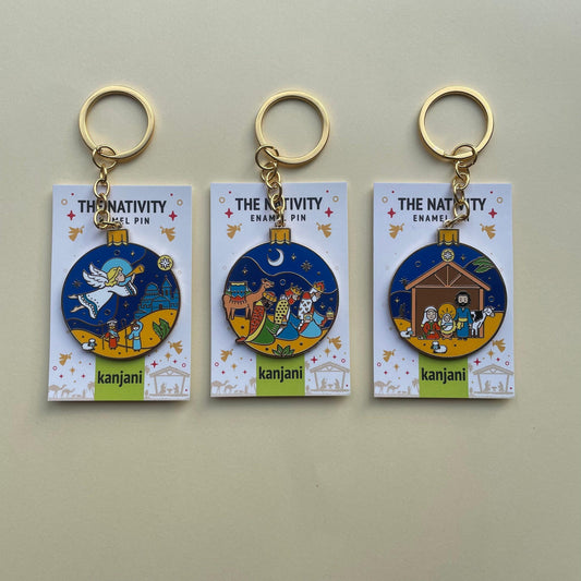 Nativity Christmas bauble keychain and magnetic enamel pin