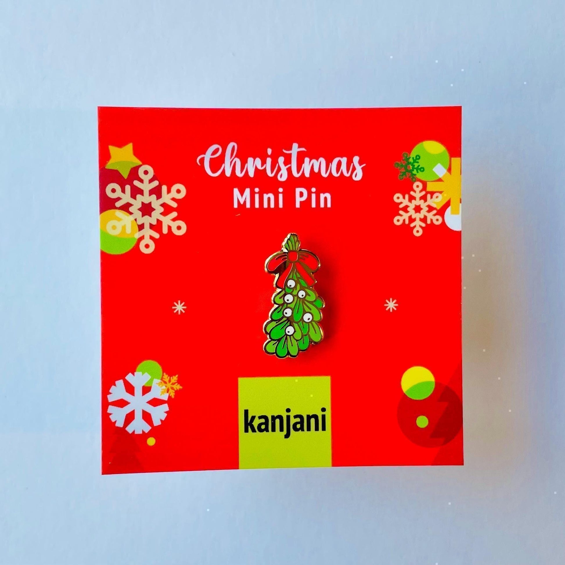 Christmas Mistletoe bunch with white berries and red ribbon gold hard enamel pin badge