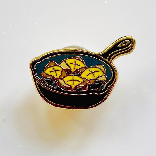 Roasting chestnuts enamel pin