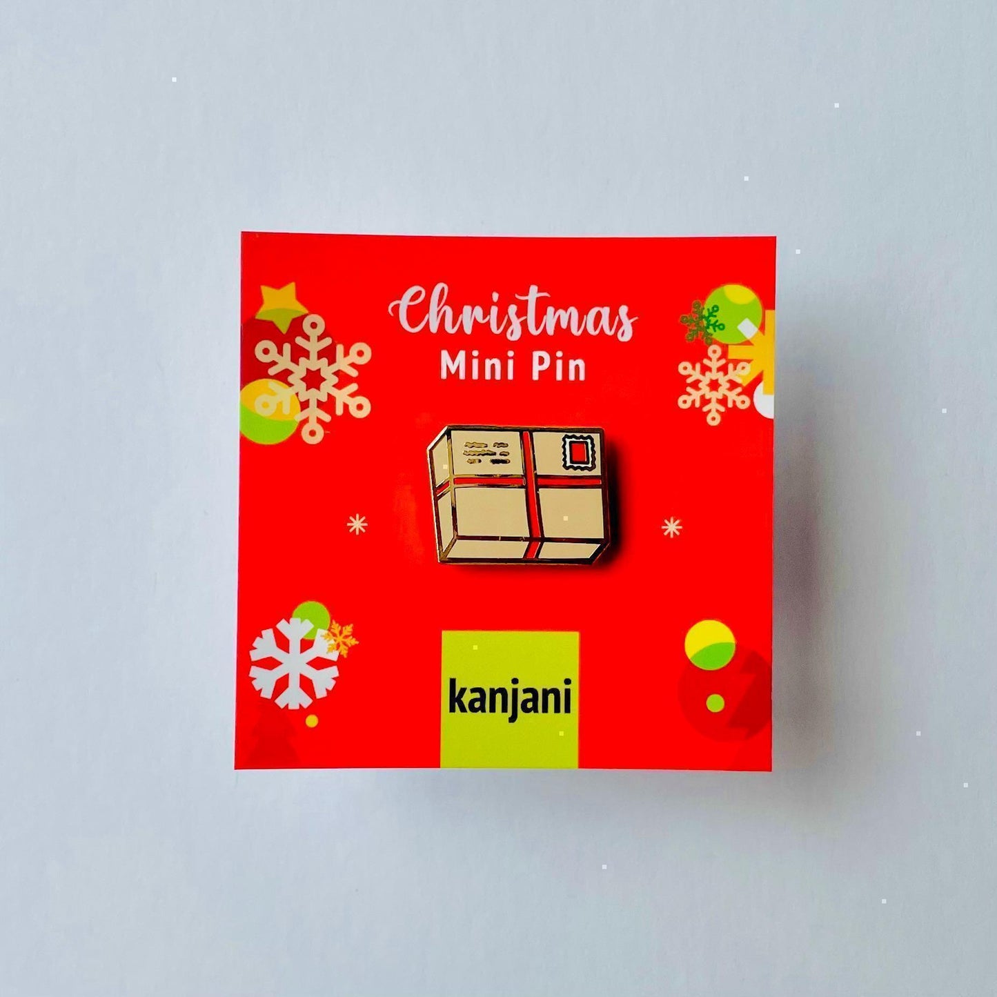 Brown and red ribbon string postal package parcel Christmas gold hard enamel pin badge