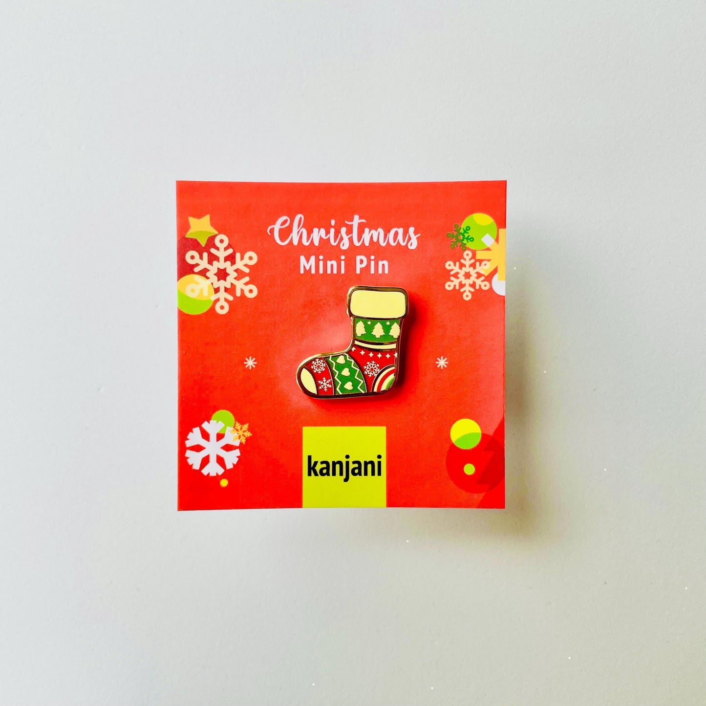 Red and green pattern Christmas stocking gold hard enamel pin