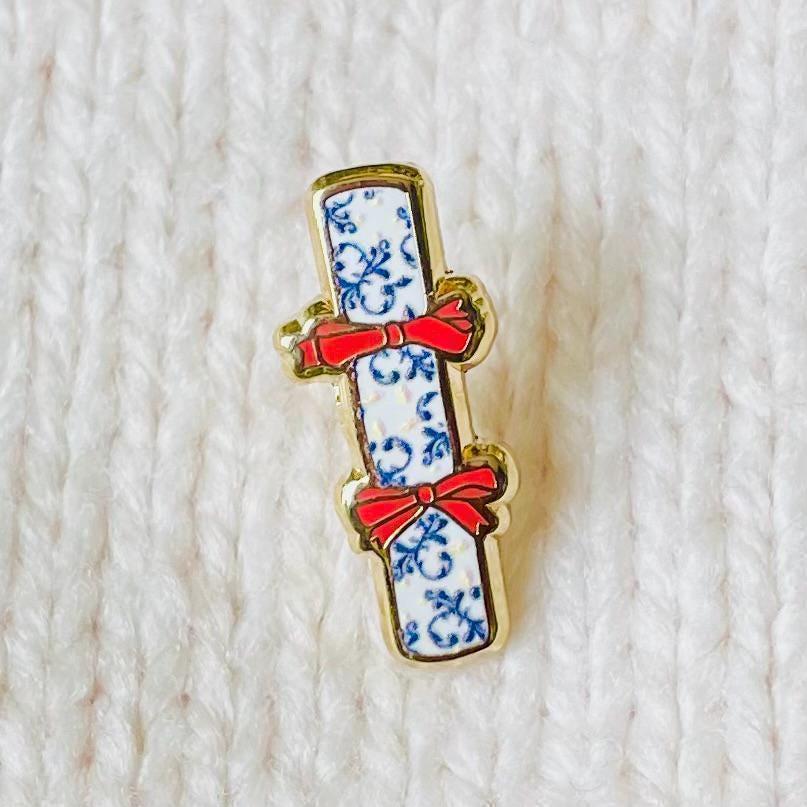 Blue and white and cream Christmas cracker gold hard enamel mini pin badge