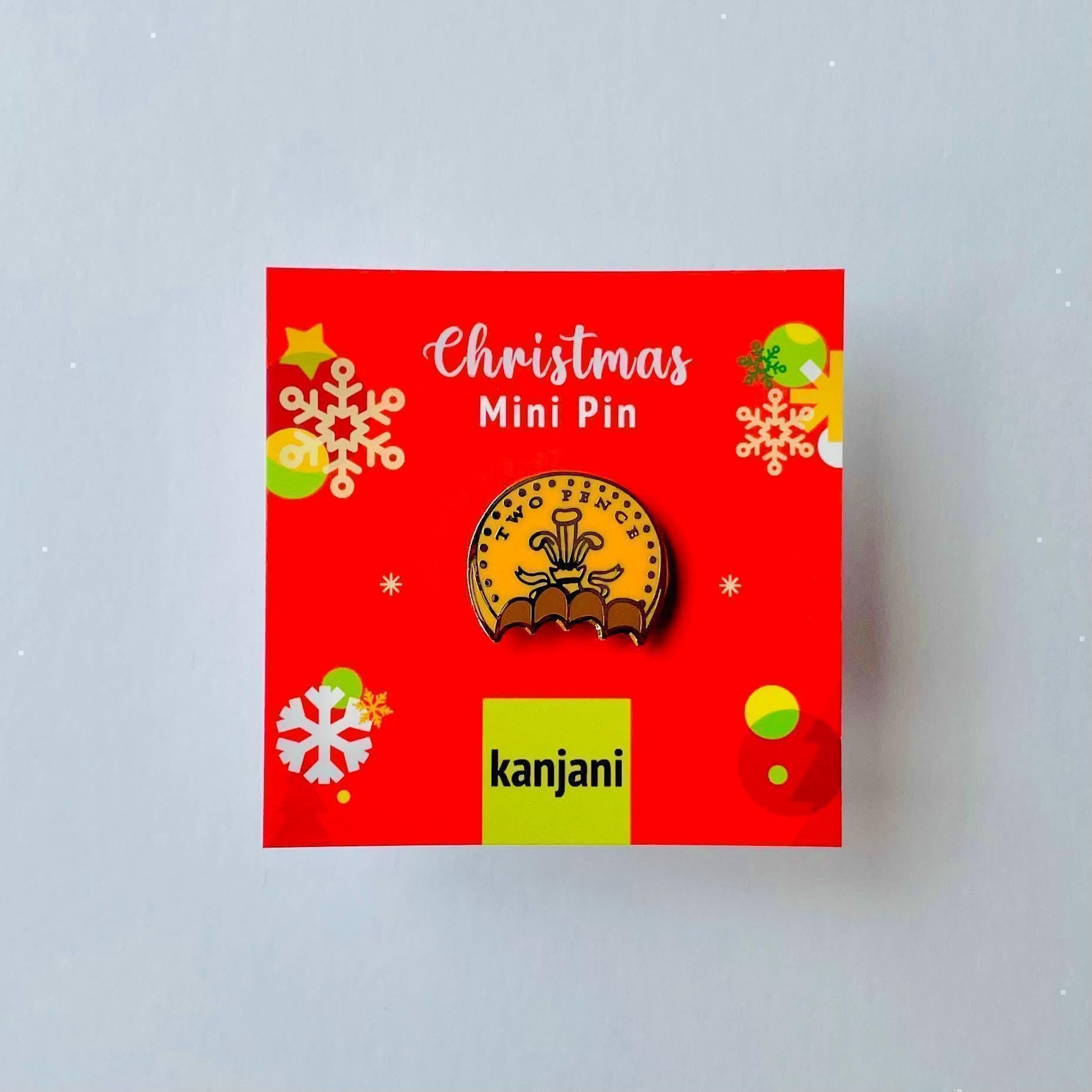 Half eaten bitten foil covered chocolate coin two pence gold hard enamel pin badge