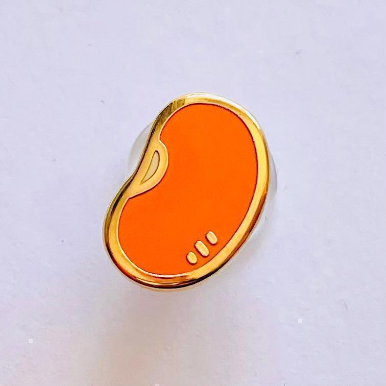 Baked bean gold hard enamel pin lapel badge