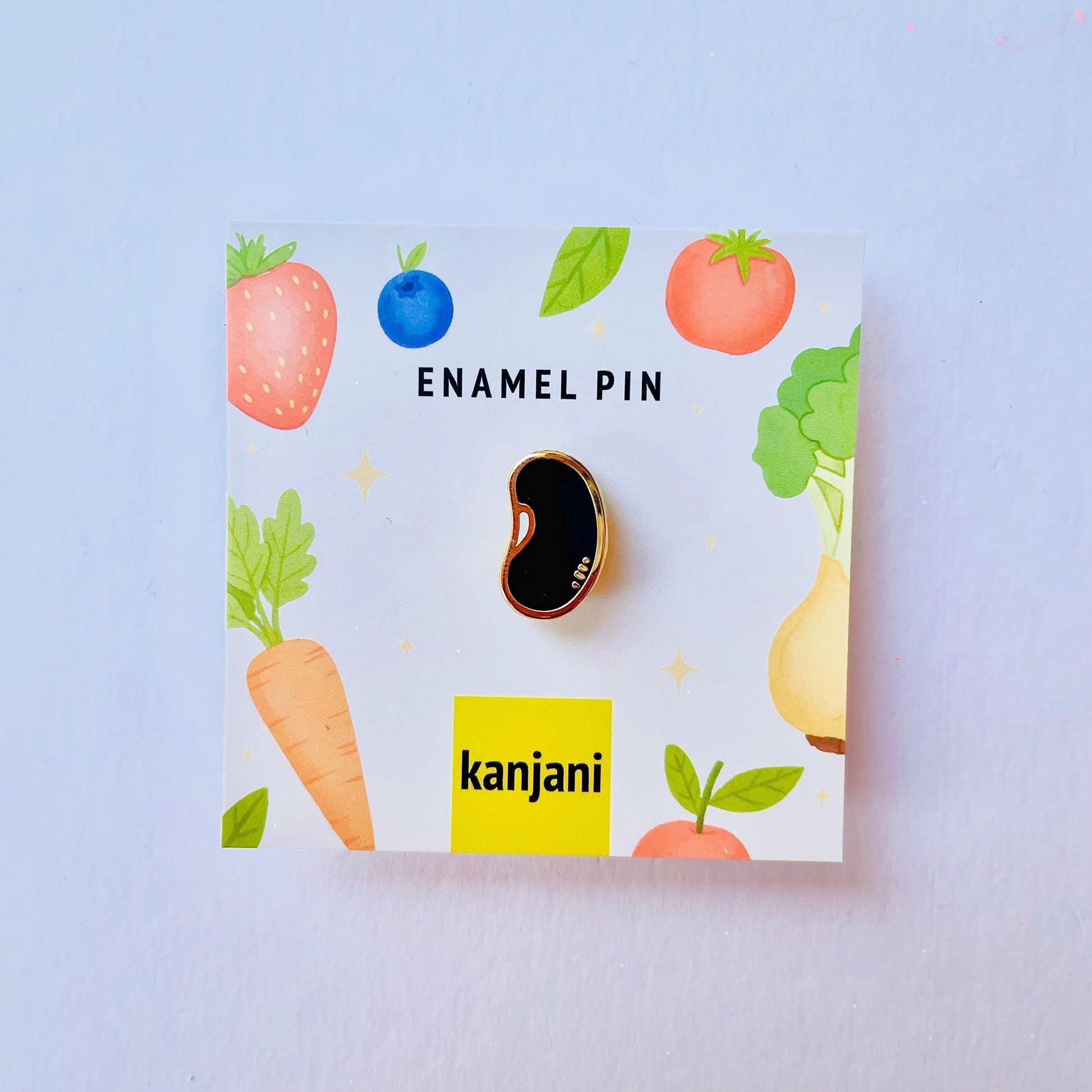 Black bean gold hard enamel pin