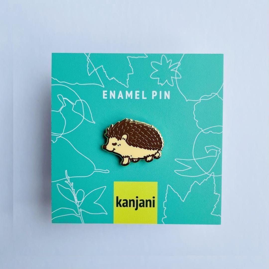 Brown and tan Garden hedgehog gold hard enamel mini pin