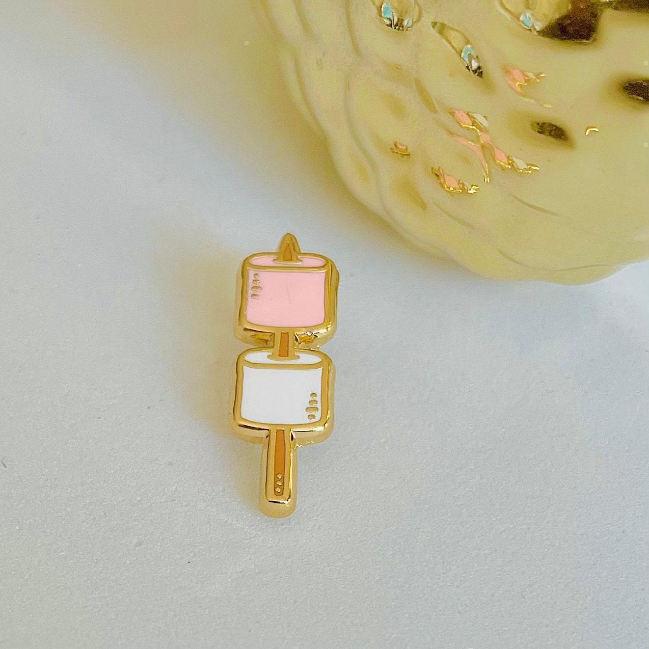Pink and white roasting marshmallows on a brown stick gold hard enamel mini pin