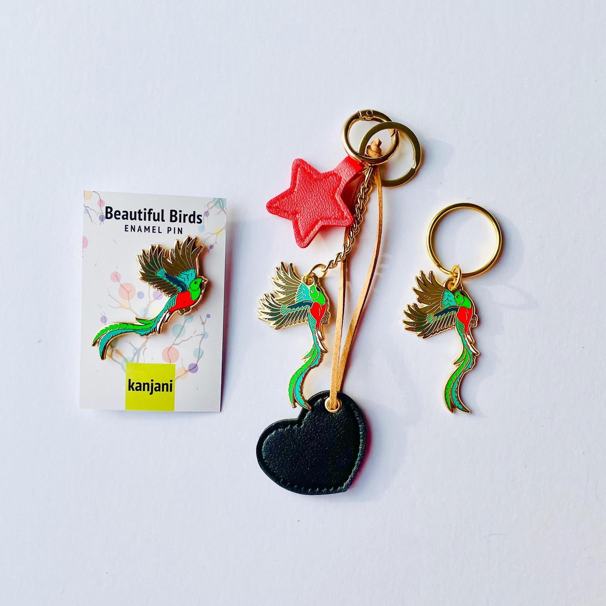 Quetzal keychain, bag charm and lapel pin in gold hard enamel